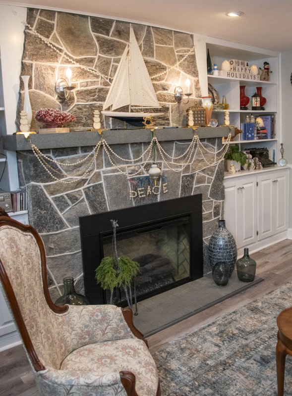 Marla and Tom Norton’s Union Street home boasts two fireplaces, and the decor incorporates artistic collections as well as a nod to sailing vessels.
